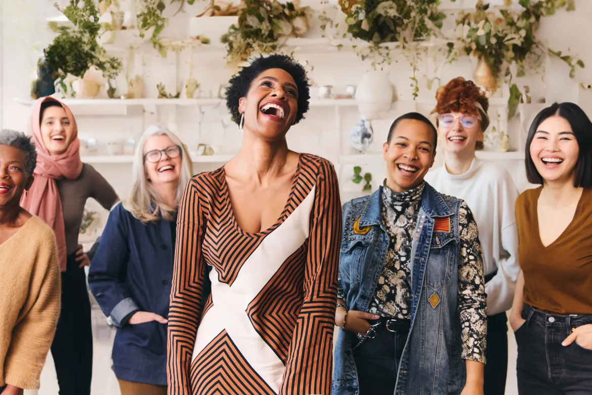Women of all ages laughing together